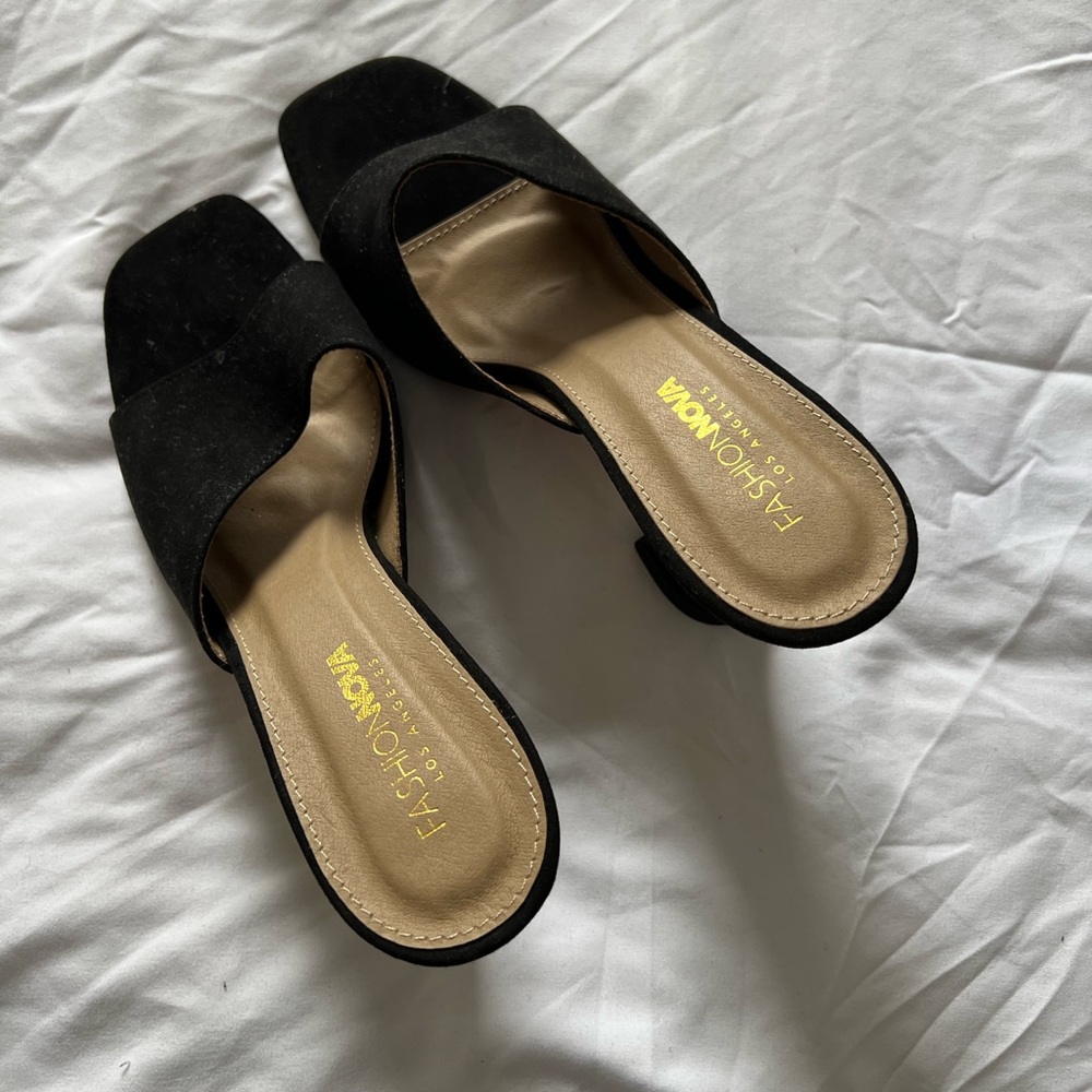 Black mules. Too big on me. Never wore them